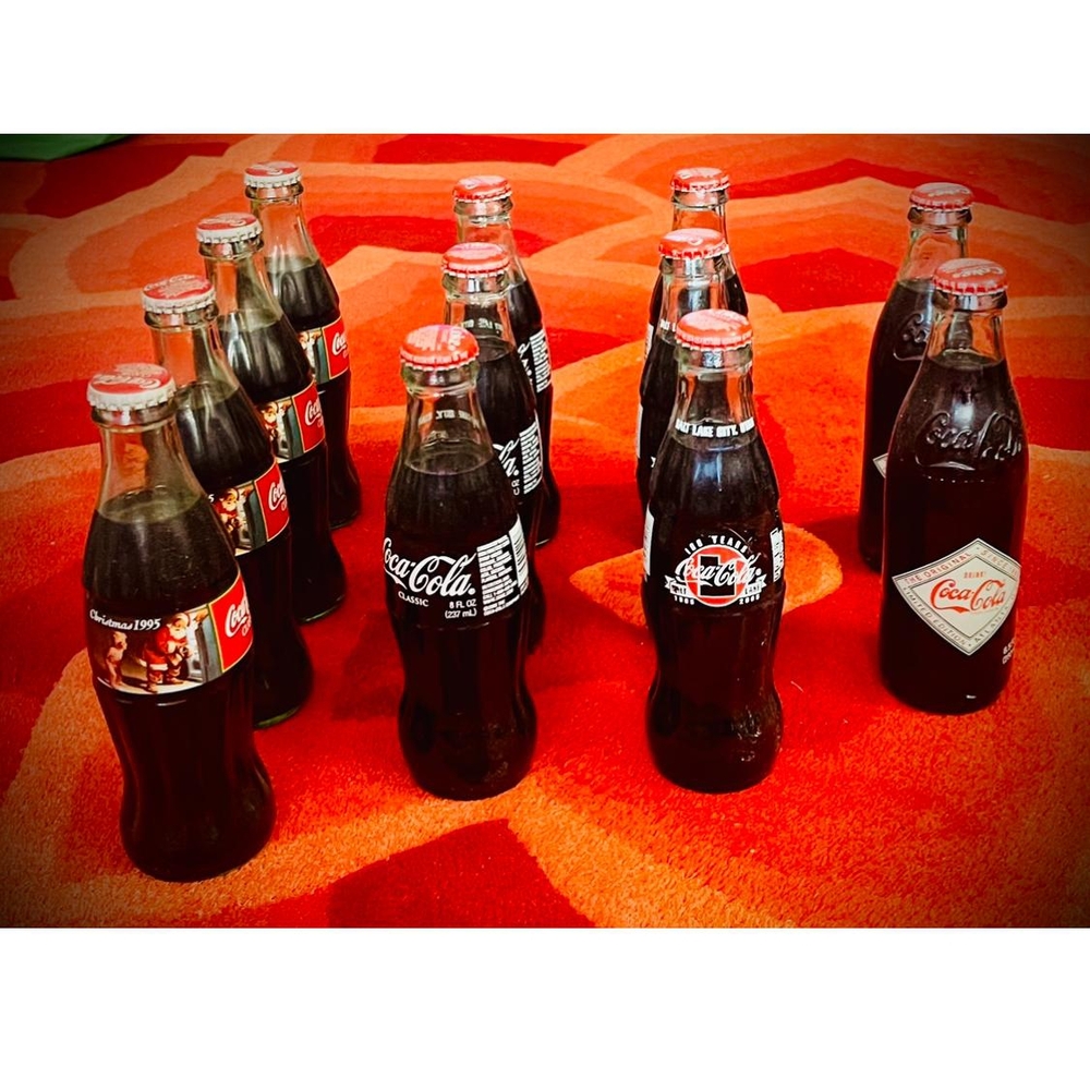 12 Vintage Full Glass Coca-Cola Bottles - Limited Edition. Great For Collectors!